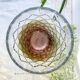Vintage glass vase with geometric pattern in rose gold gradient
