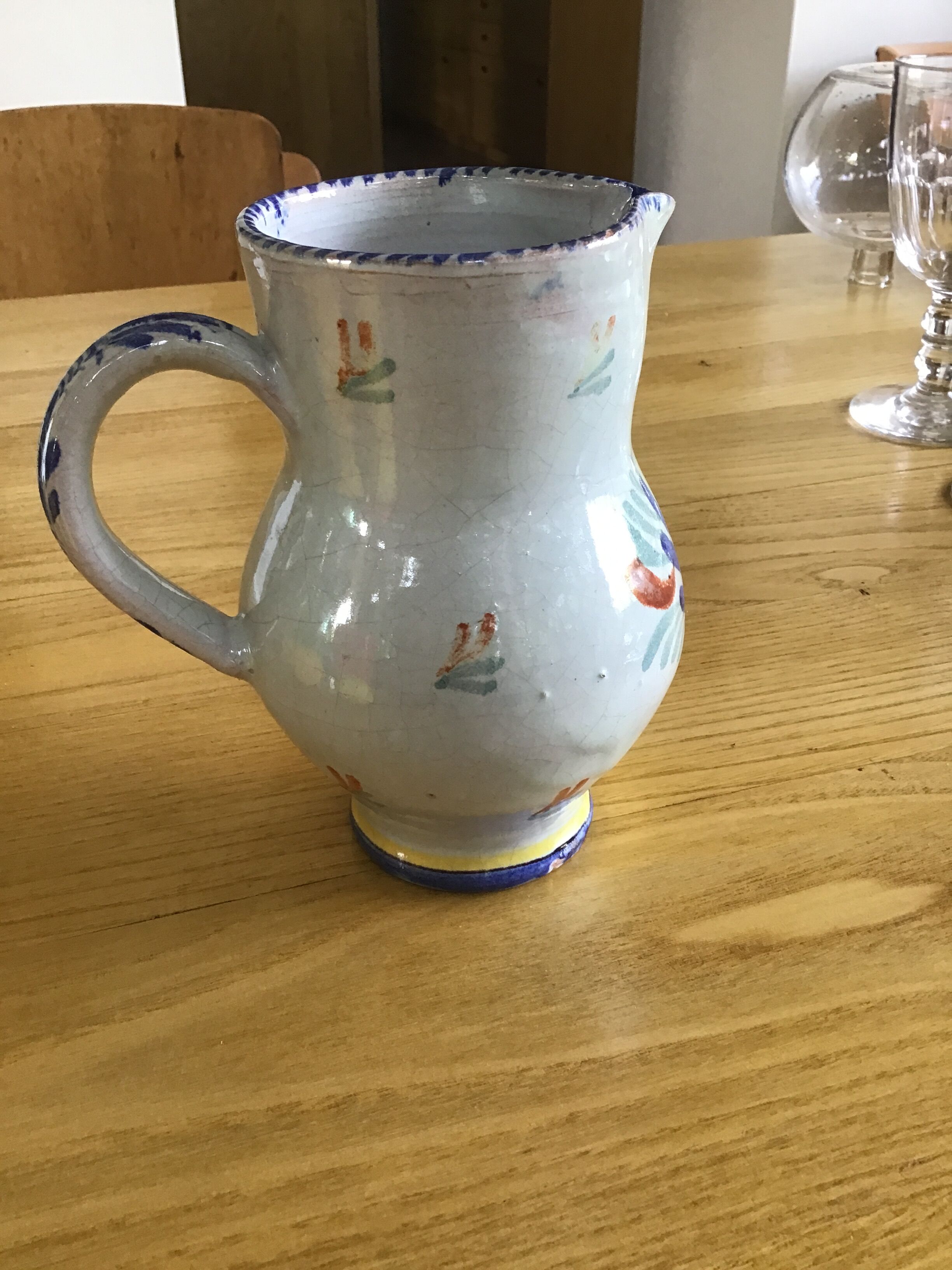 Earthenware pitcher with blue decor