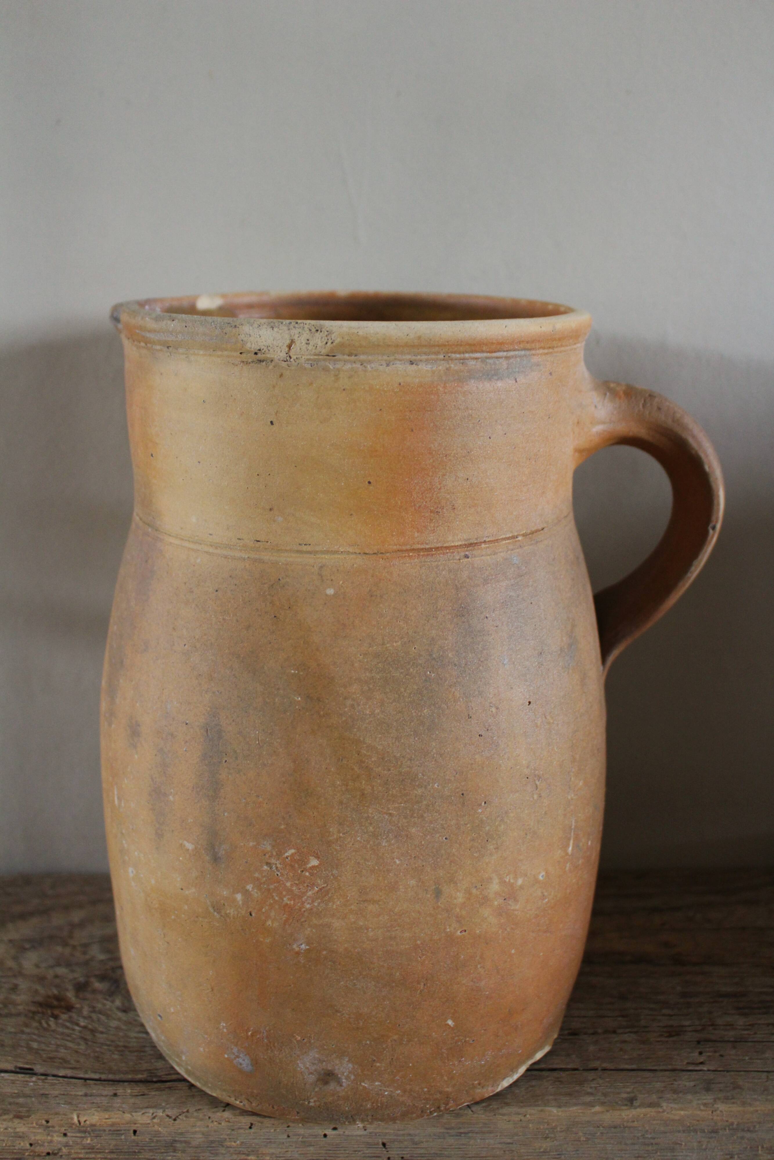 Vintage artisanal terracotta jug