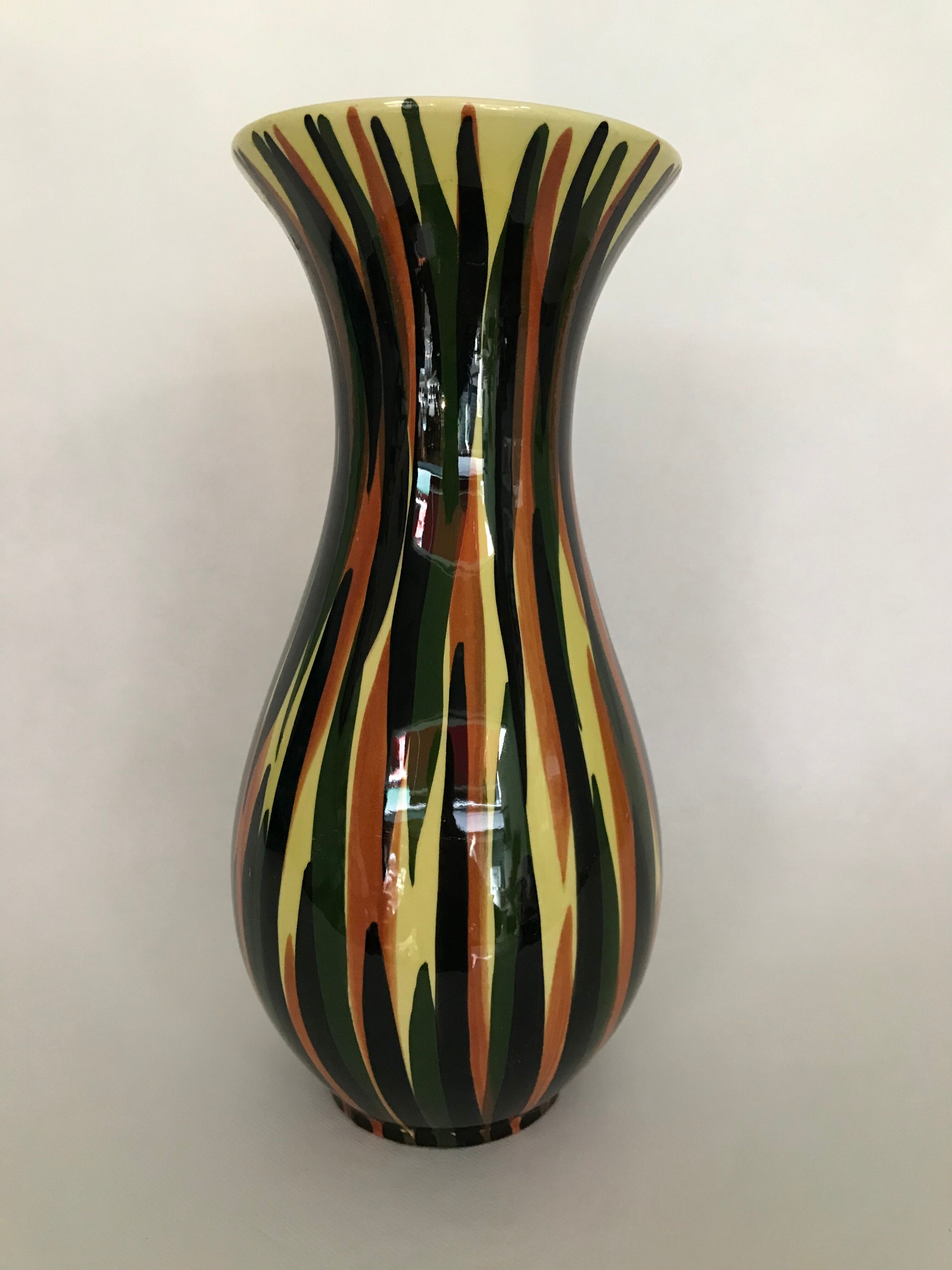 Saint Clement's diabolo vase, decorated with hand-painted polychrome flames, numbered 1950/1960