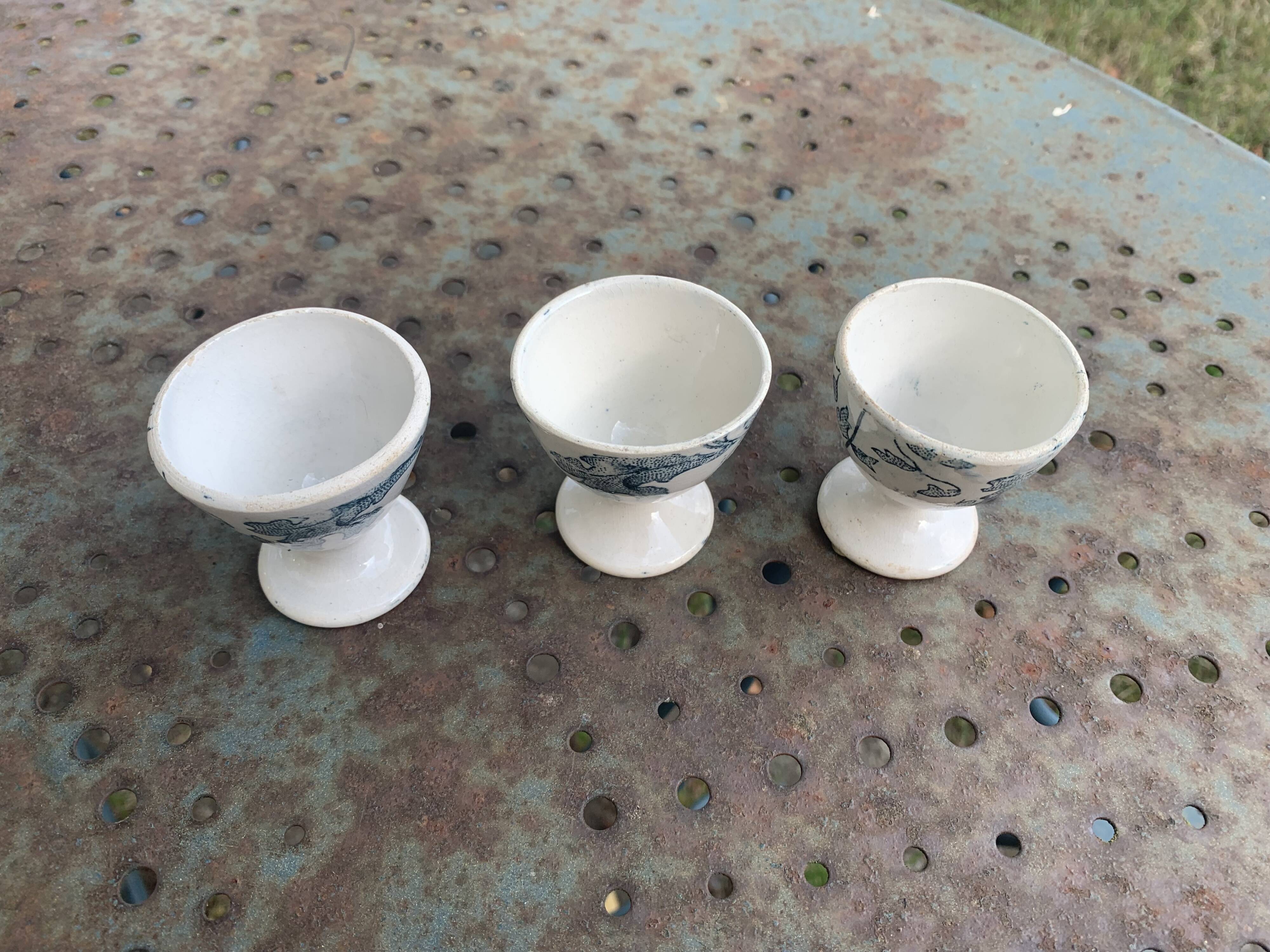 3 white earthenware egg cups, blue foliage decor, Grigny fire clay, made in France