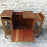 Bar cabinet on casters in walnut