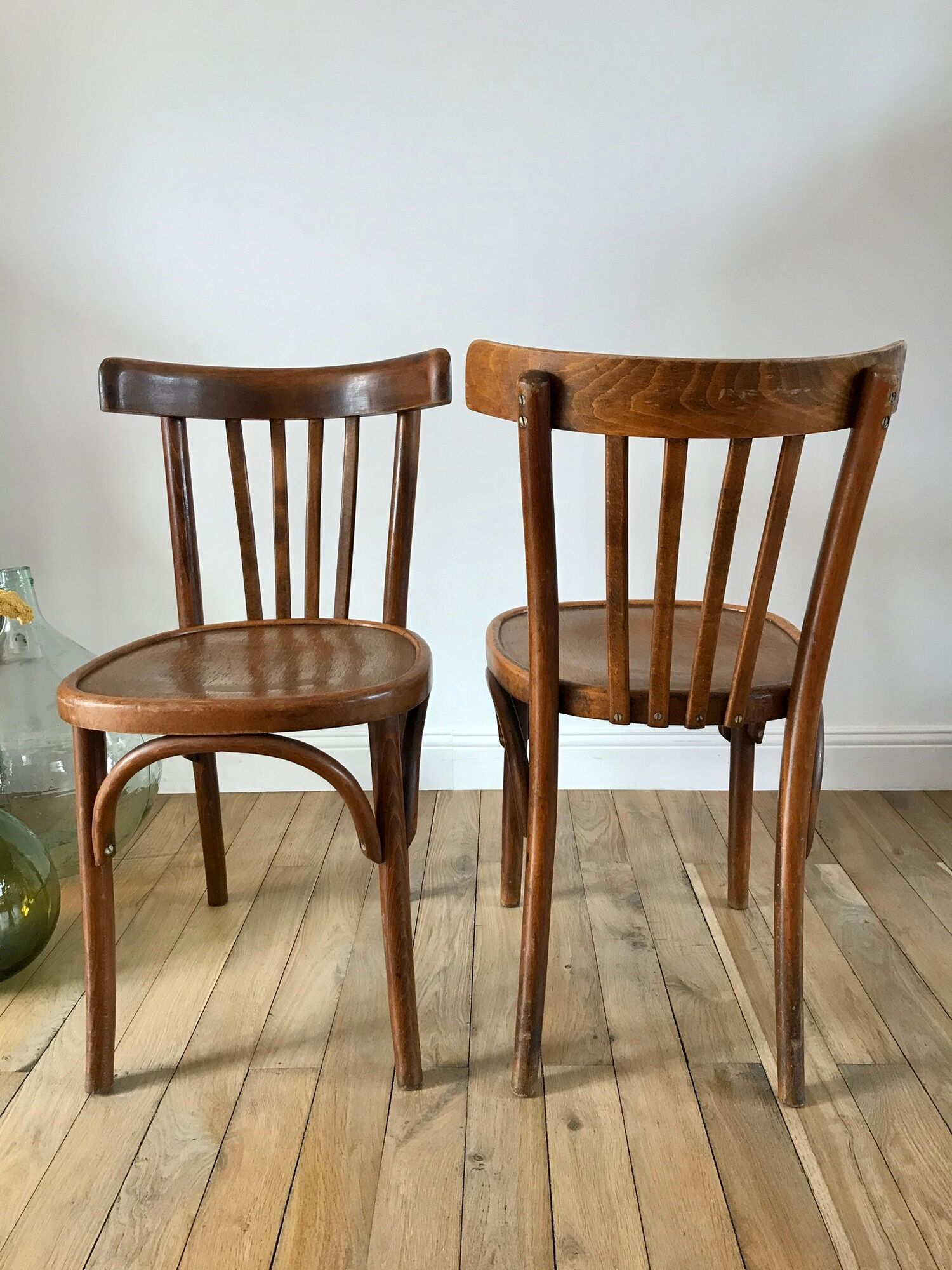 Pair of Baumann curved wood bistro chairs early twentieth century
