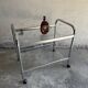 Vintage silver chrome-plated steel and glass two-tier serving trolley with wheels