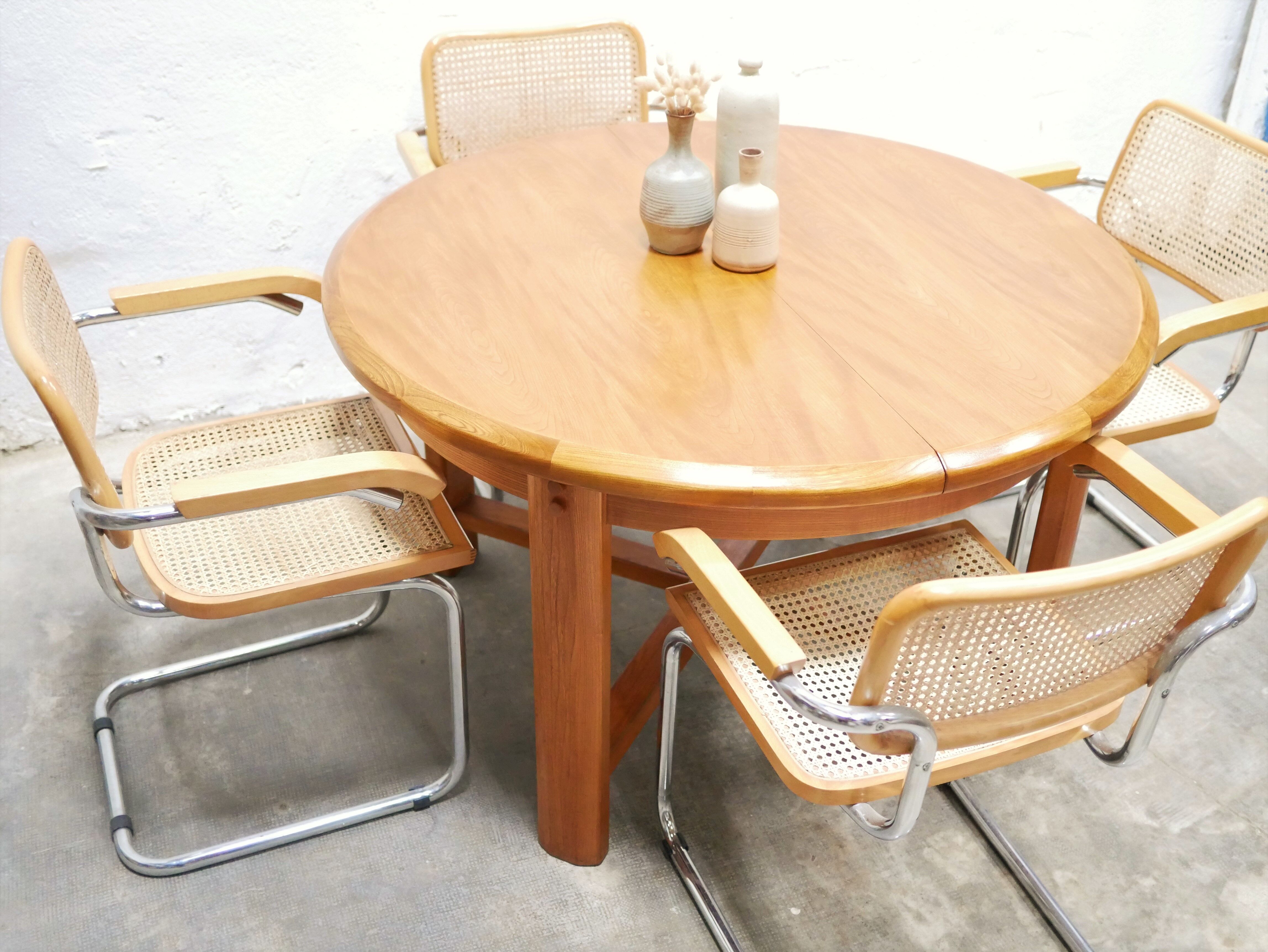 Vintage extendable round wooden dining table