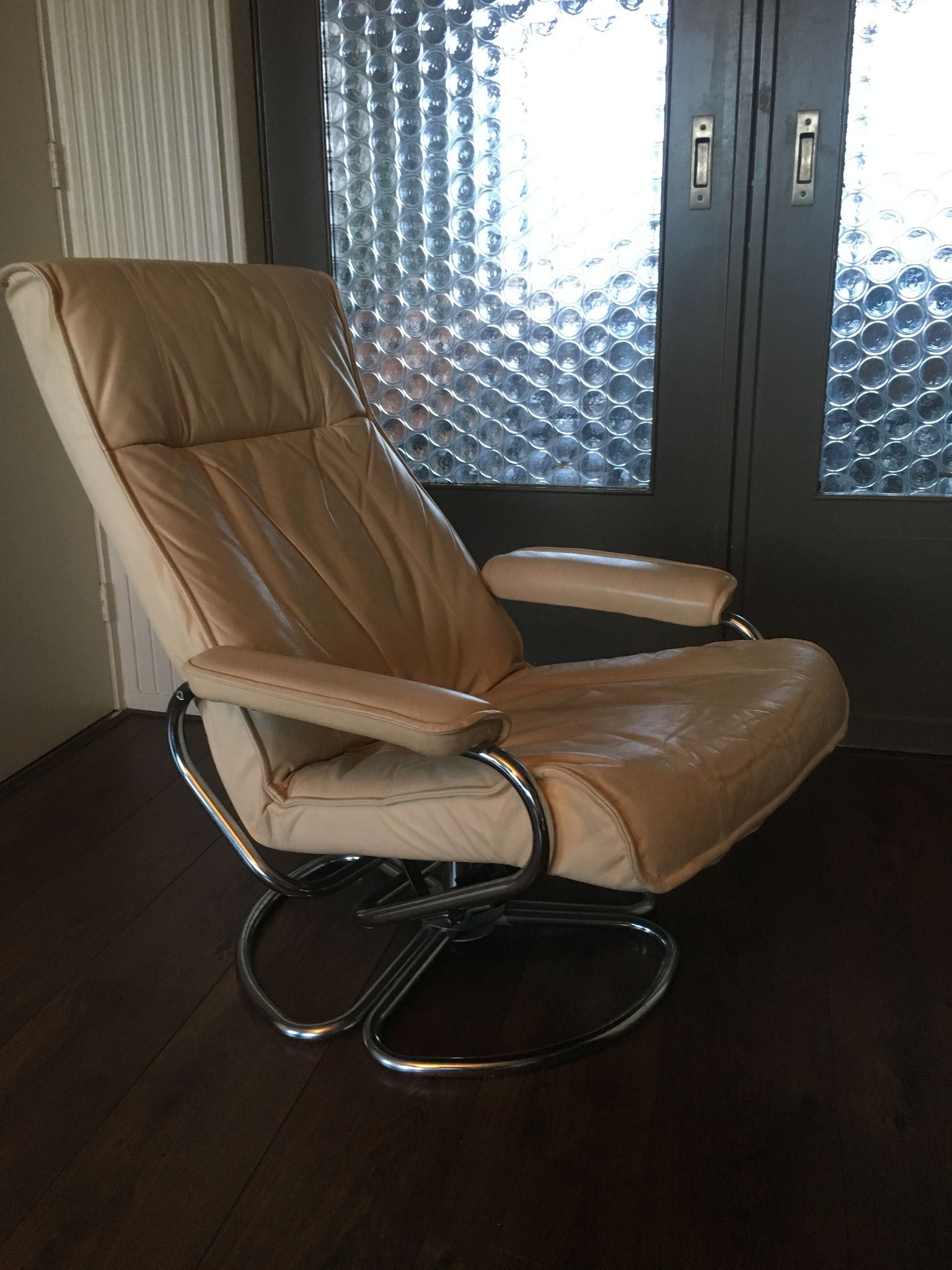 Mid-century danish leather & tubular steel swivel lounge armchair