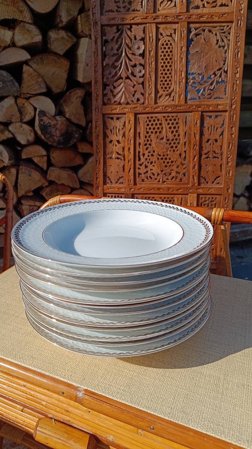 Twelve white porcelain plates