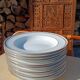 Twelve white porcelain plates