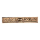 Carved wooden pediment with bunches of grapes