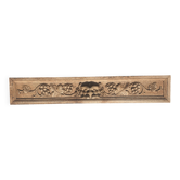 Carved wooden pediment with bunches of grapes