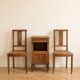 Art Deco bedroom set: 2 chairs and a wooden bedside table.
