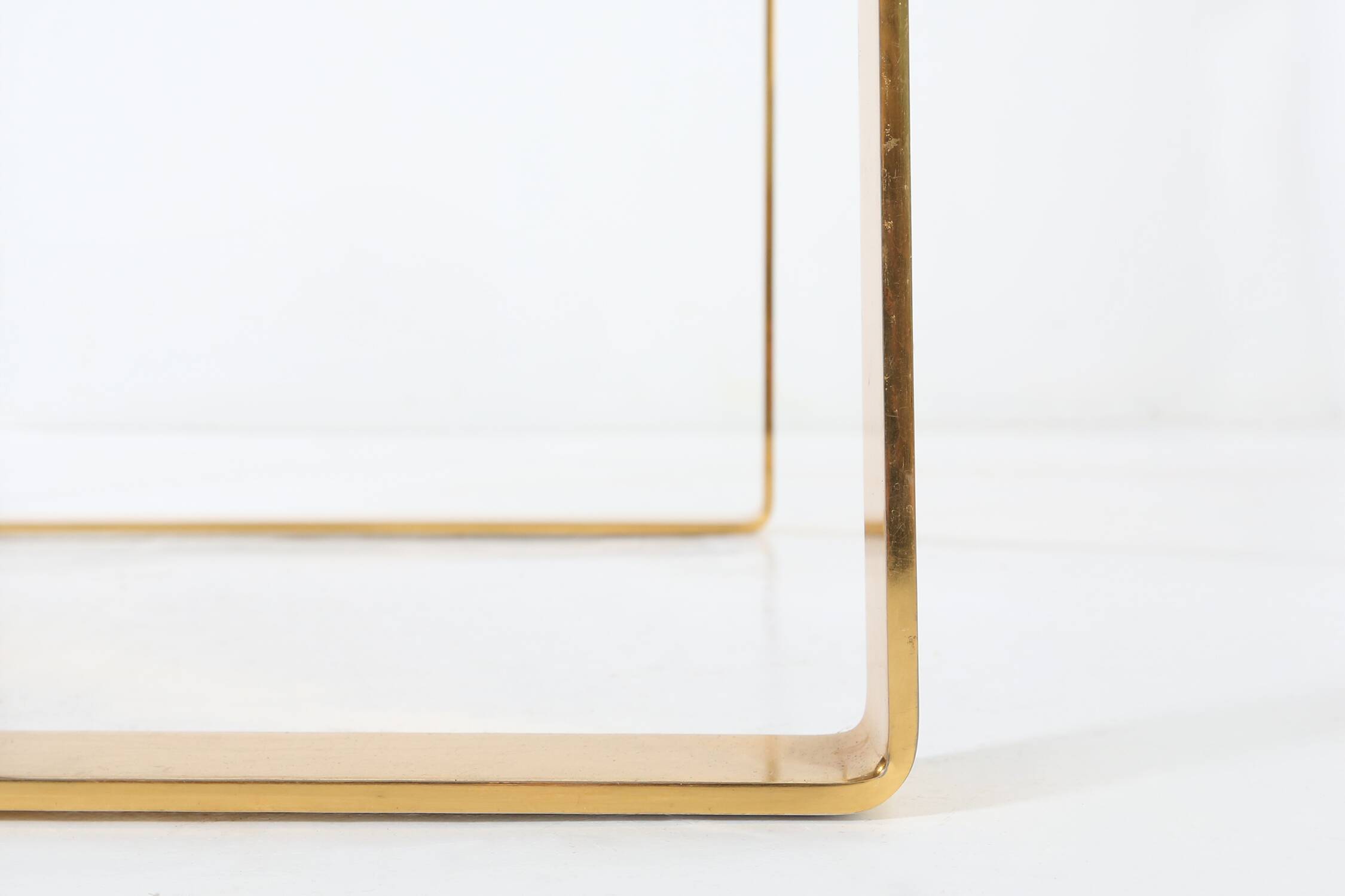 Mid-century coffee table with gold plated base and glass top, 1970s