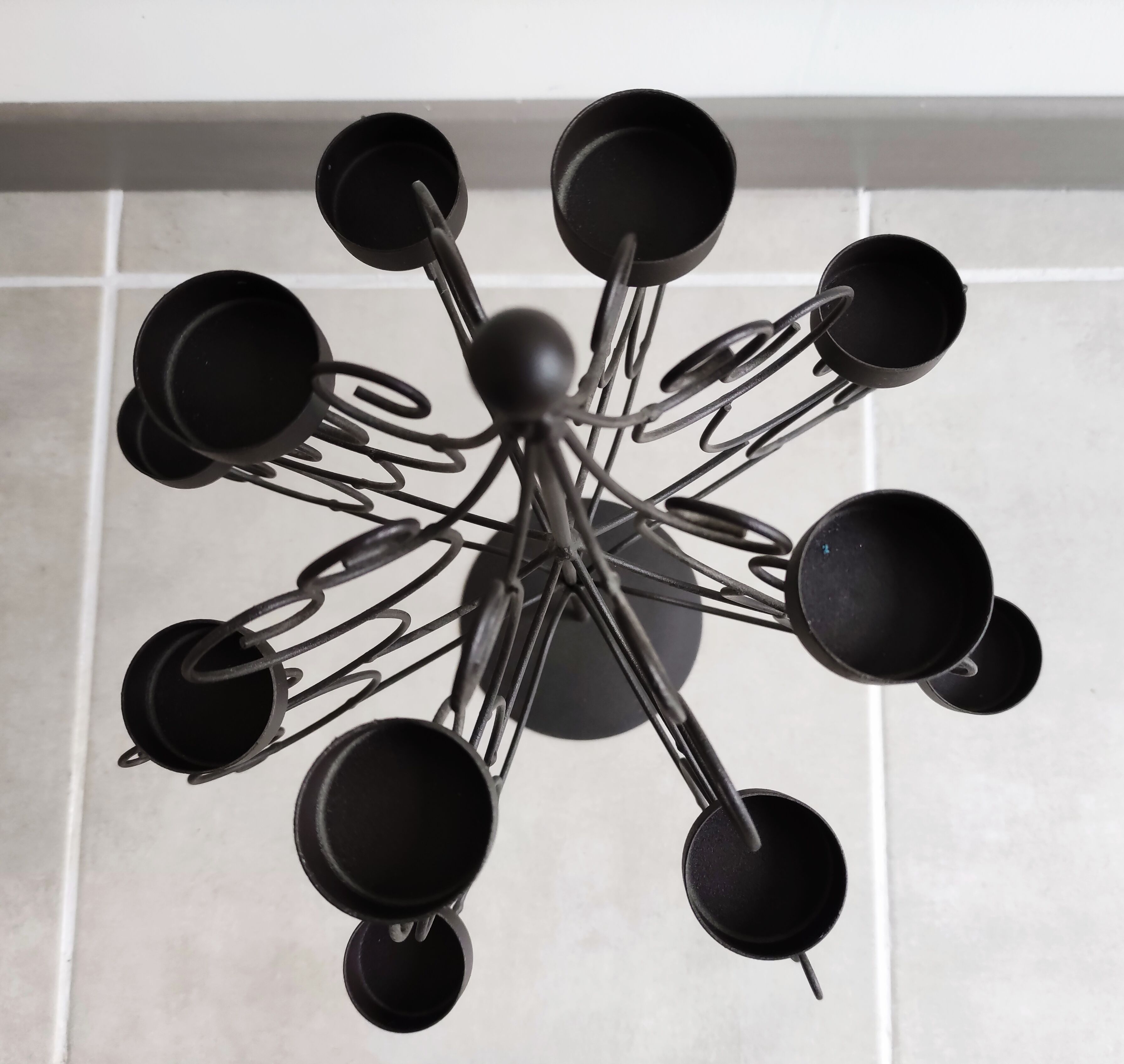 Black metal candlestick for 12 candles