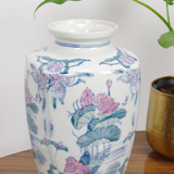 Vintage porcelain vase with pink flowers