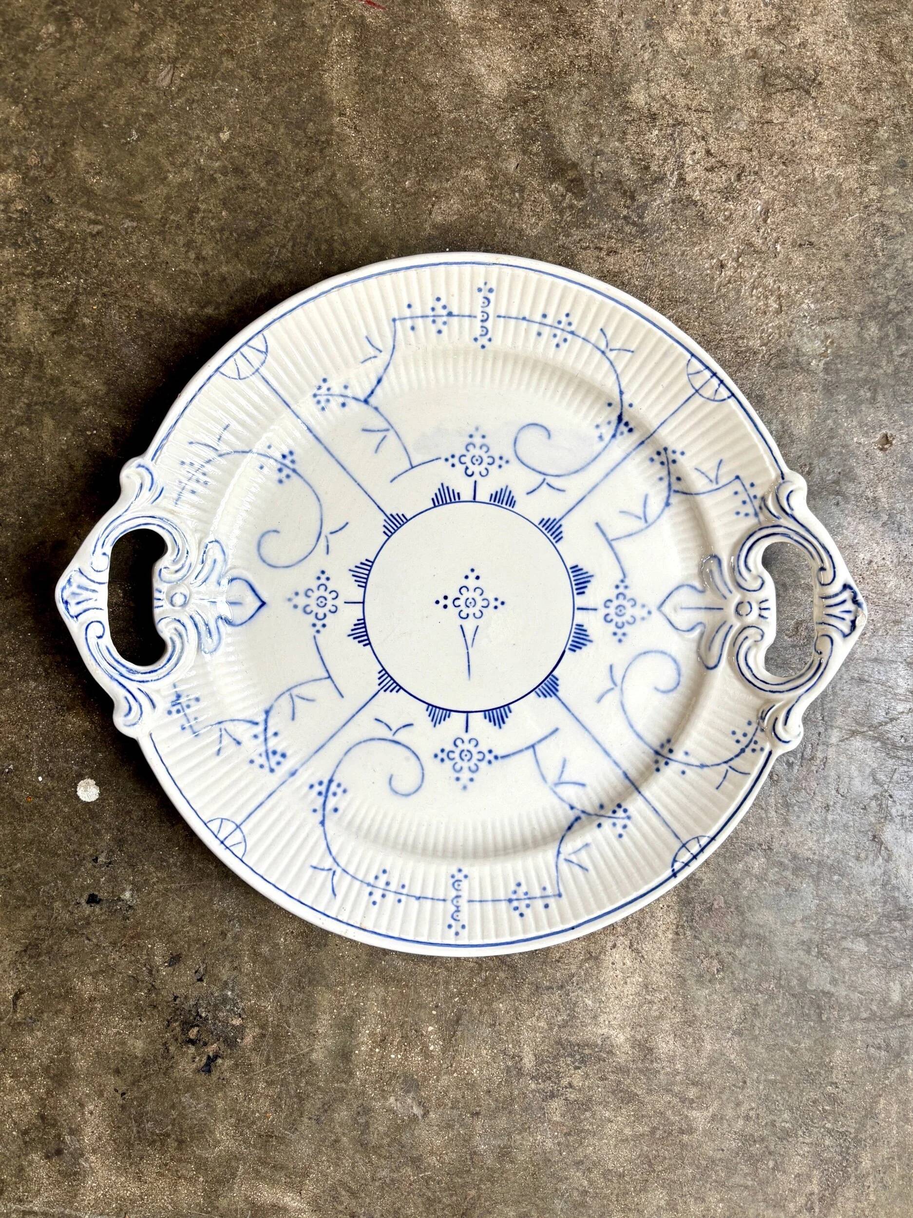 Round earthenware plate by Boch La Louvière in blue glazed earthenware, "Copenhagen" service - 1920s-30s.