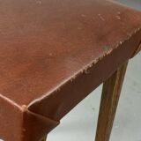 Small stool or footrest in wood and leather