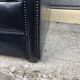 Canapé noir Chesterfield