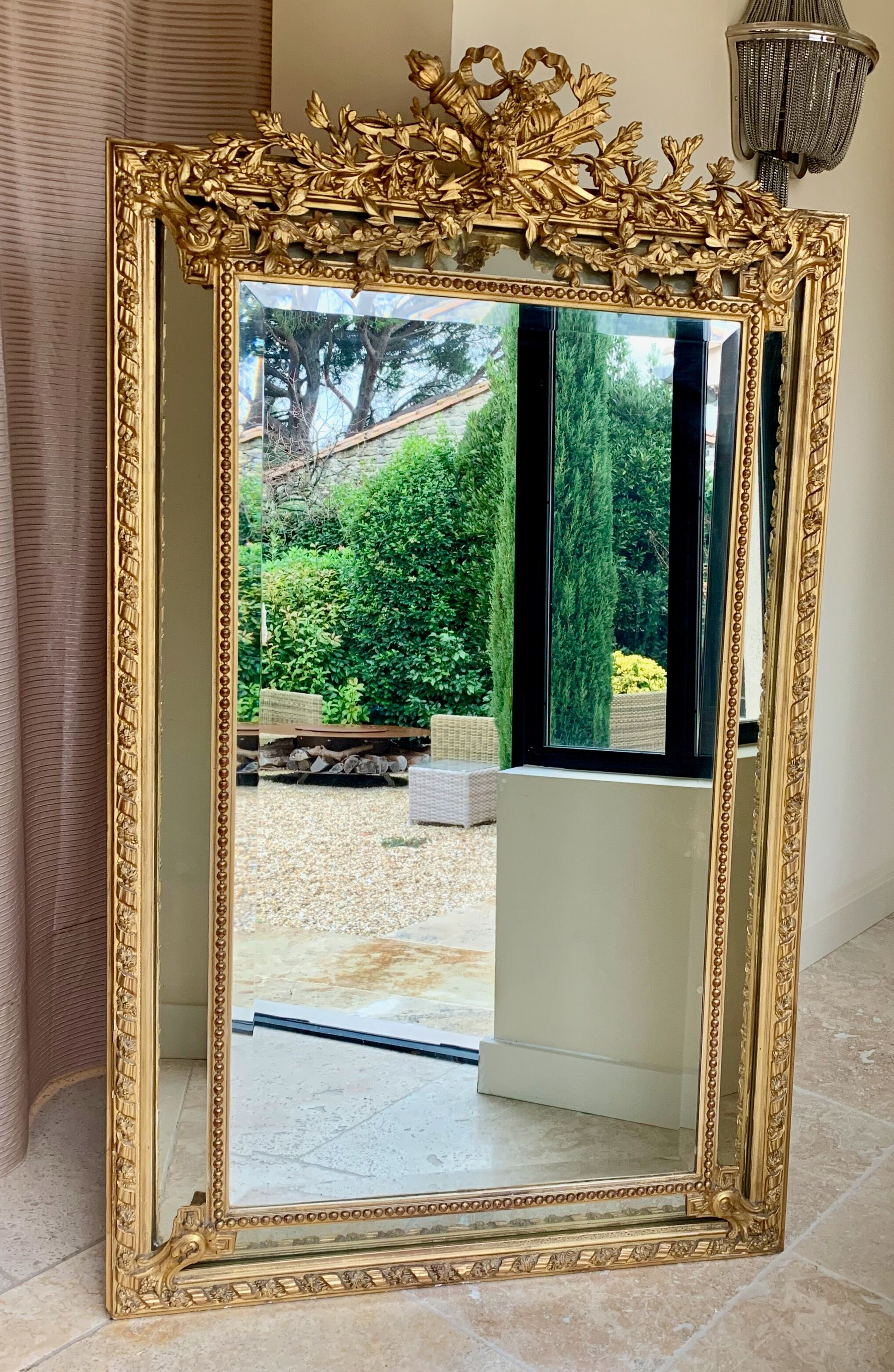 Large mirror style Louis XVI in gilded wood with parecloses xixth h: 165 cm