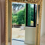 Large mirror style Louis XVI in gilded wood with parecloses xixth h: 165 cm