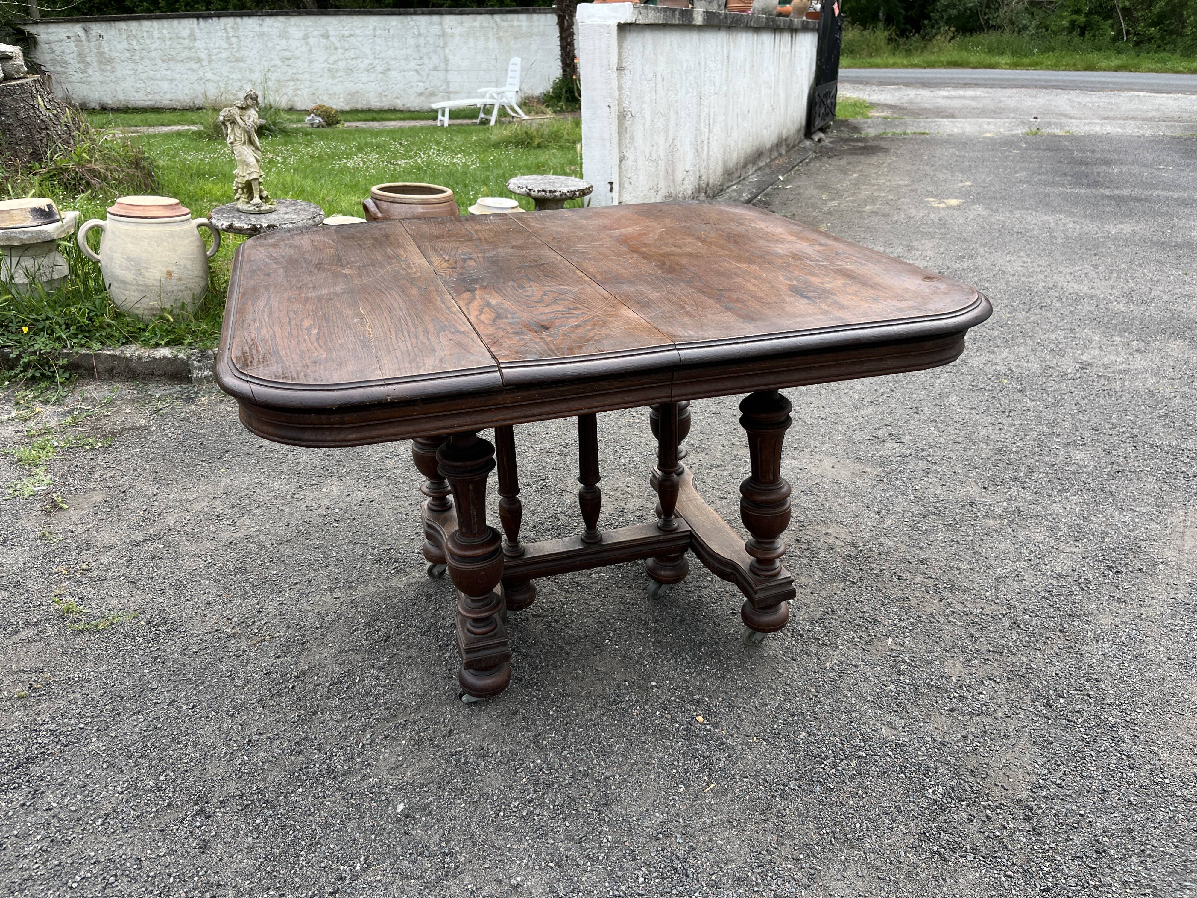 Henry II style oak dining table