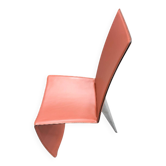 Red leather armchair in modern Italian style, signed Philippe Starck, 1980s.