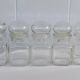 Lot de cinq pots d'apothicaire en verre transparent
