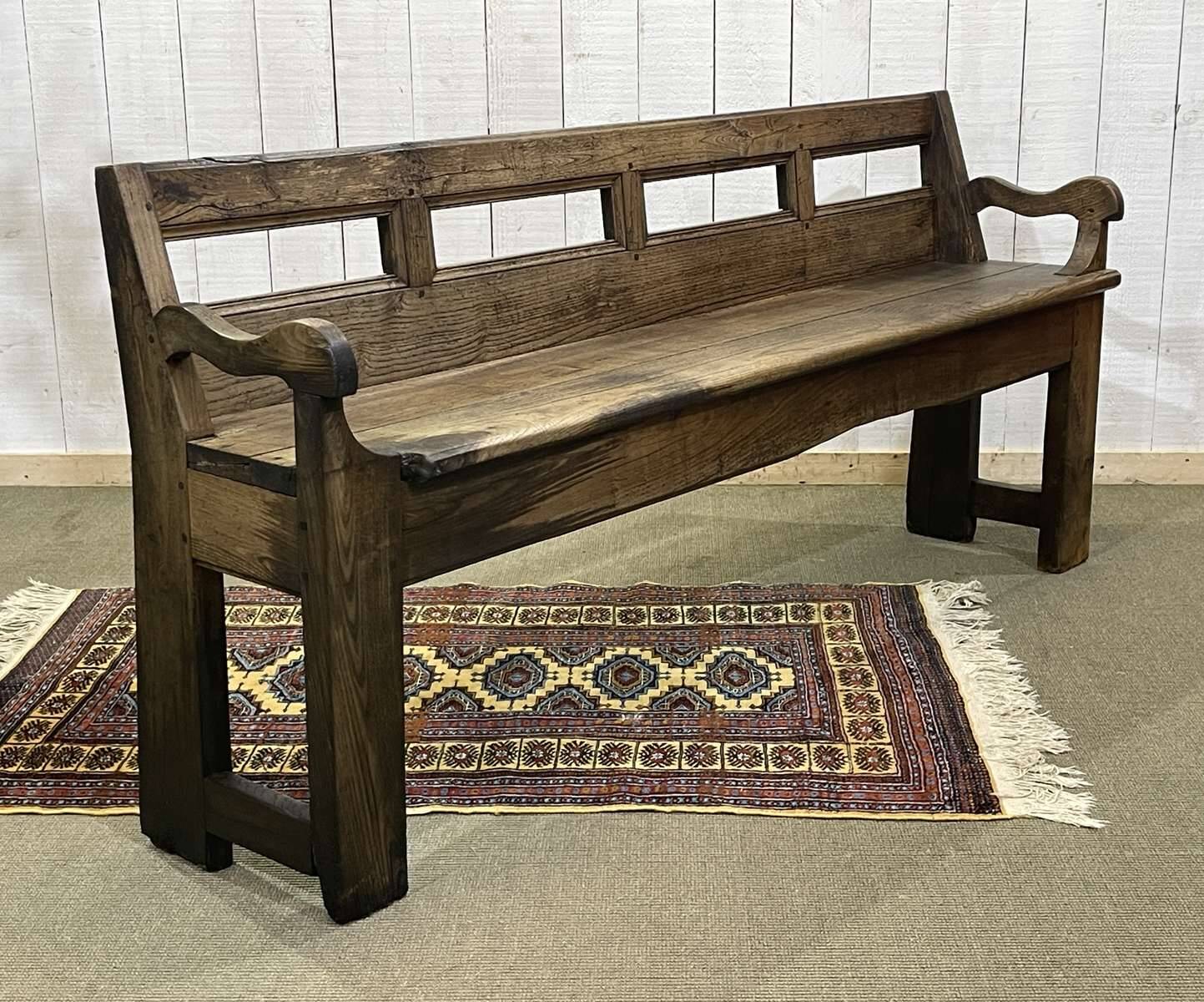 Rustic chestnut bench from the late 19th century.