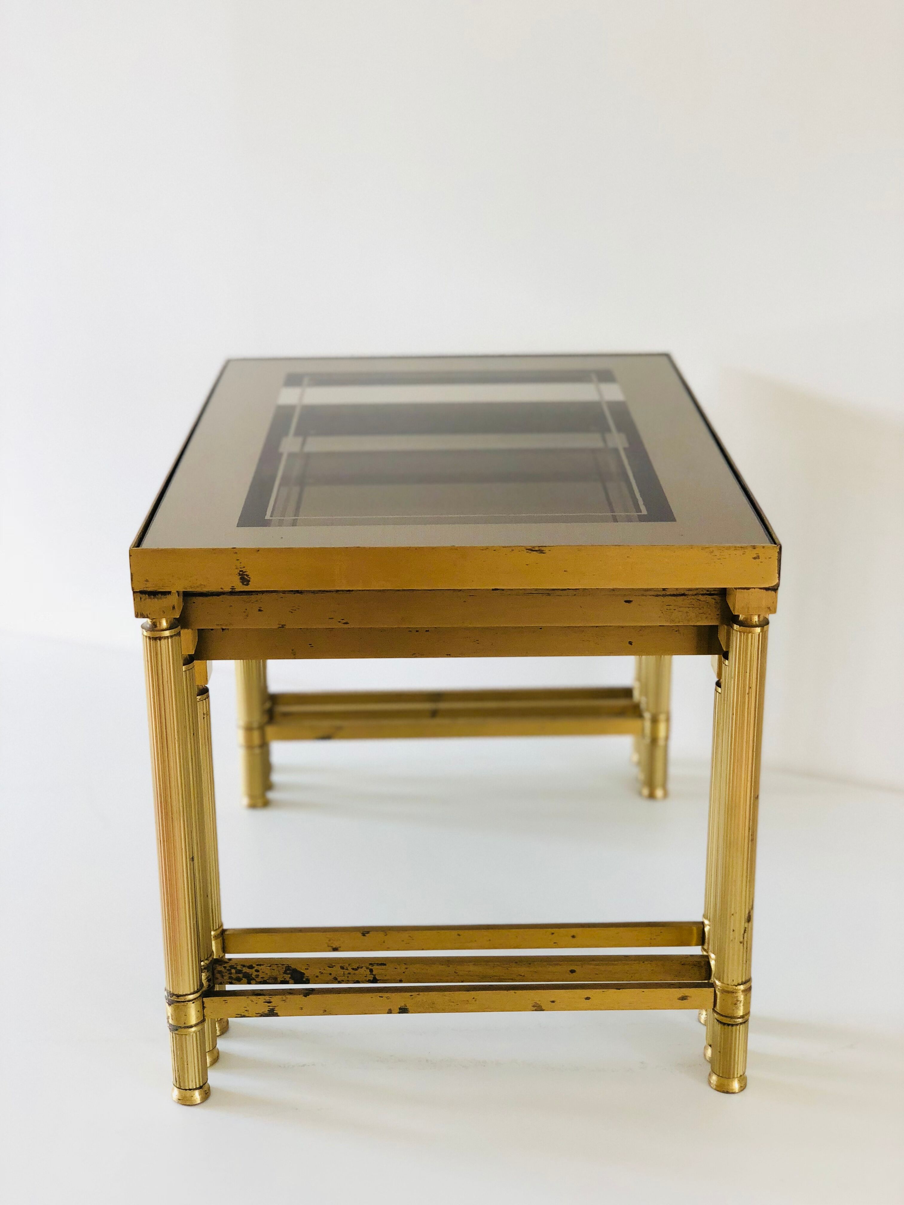 Brass and smoked glass trundle table