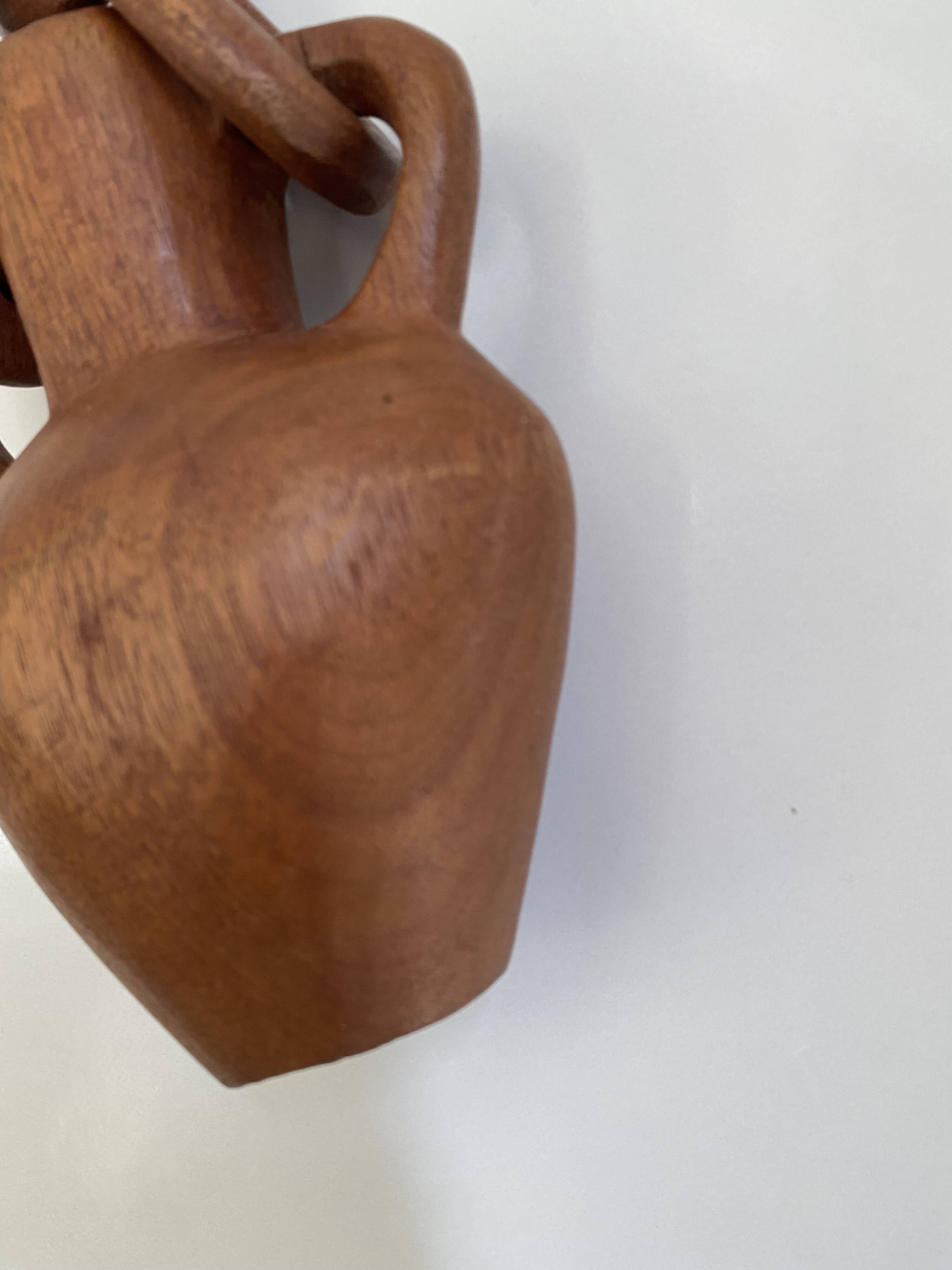 Vase and wooden chain to hang