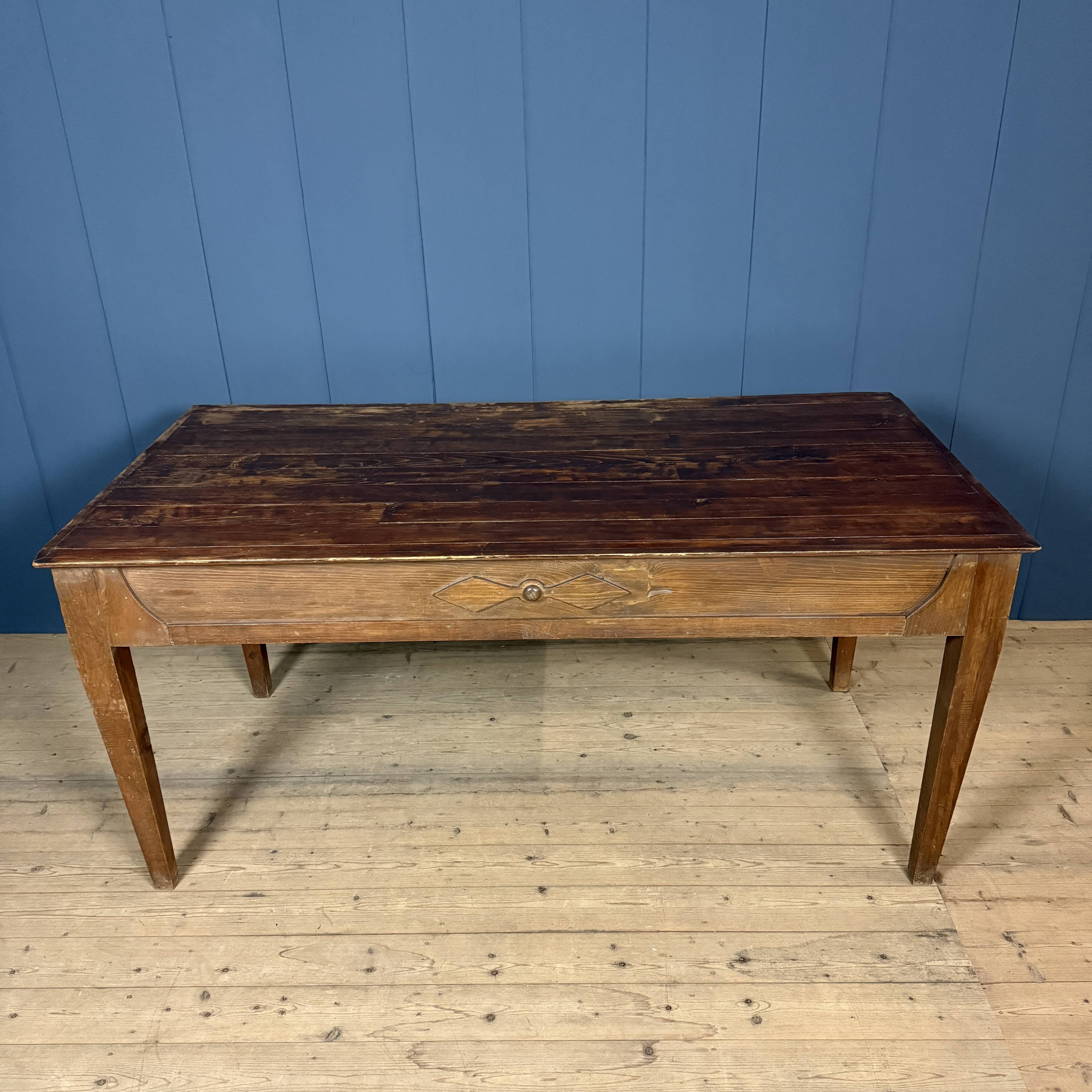 Old decorated wooden kitchen table