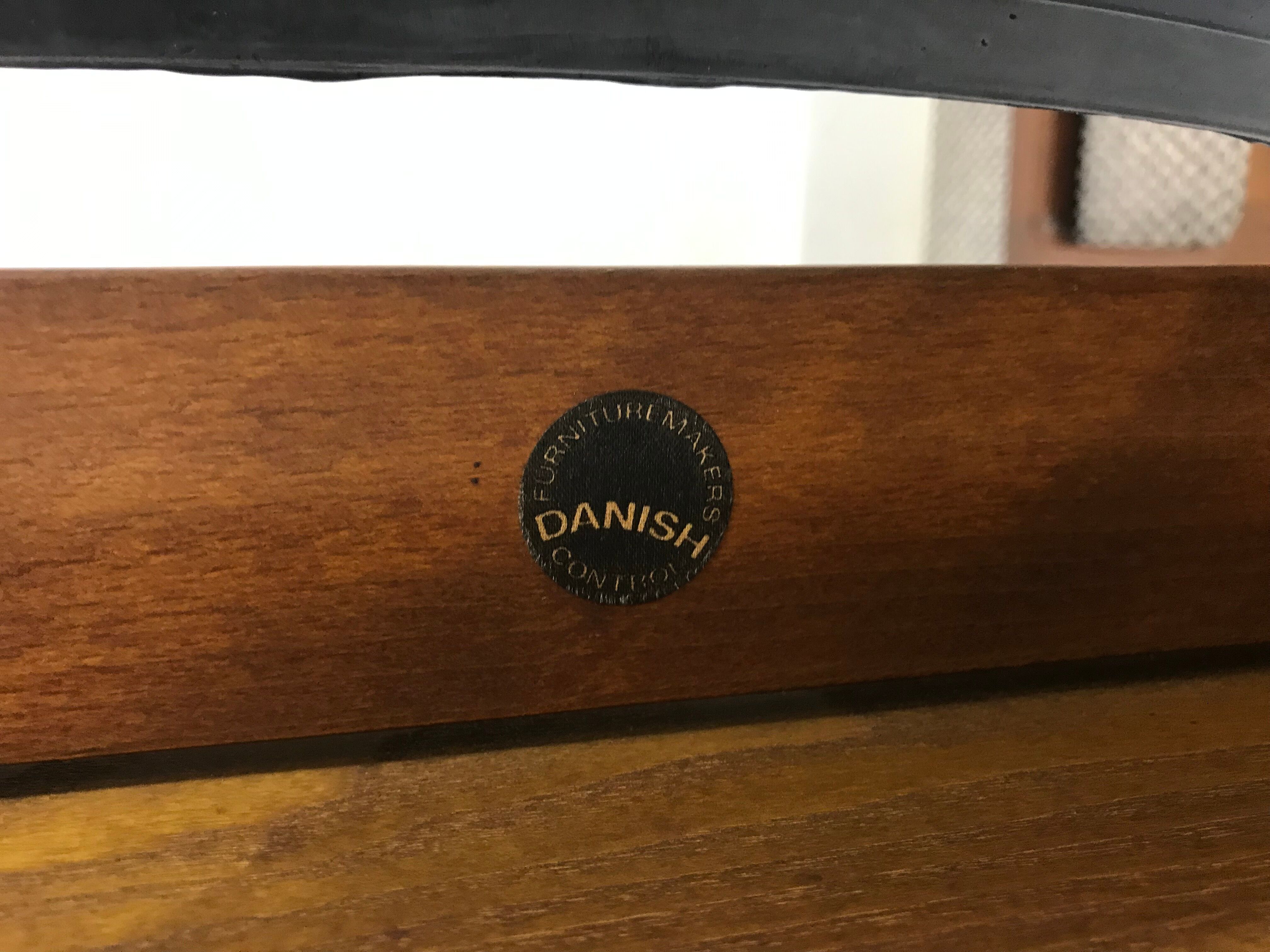 Pair of teak chairs in black leather by Illum Wikkelsoe for Niels Eilersen, Denmark