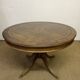 Empire style round table "Lion's Paws"