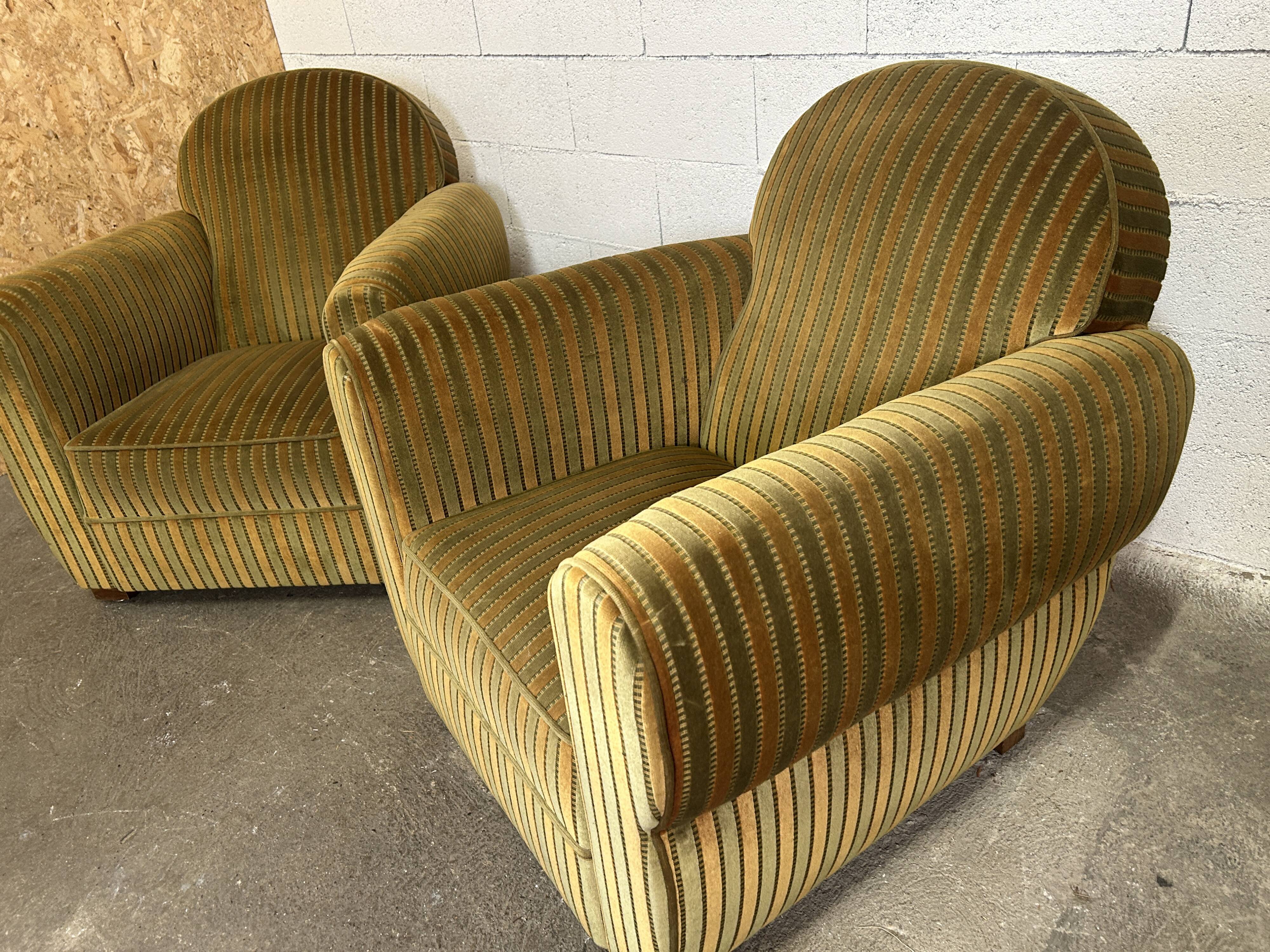 Pair of green fabric armchairs