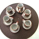 6 coffee cups and sandstone subcups