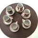 6 tasses à café et sous-tasses en grès