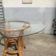Rattan and glass dining table