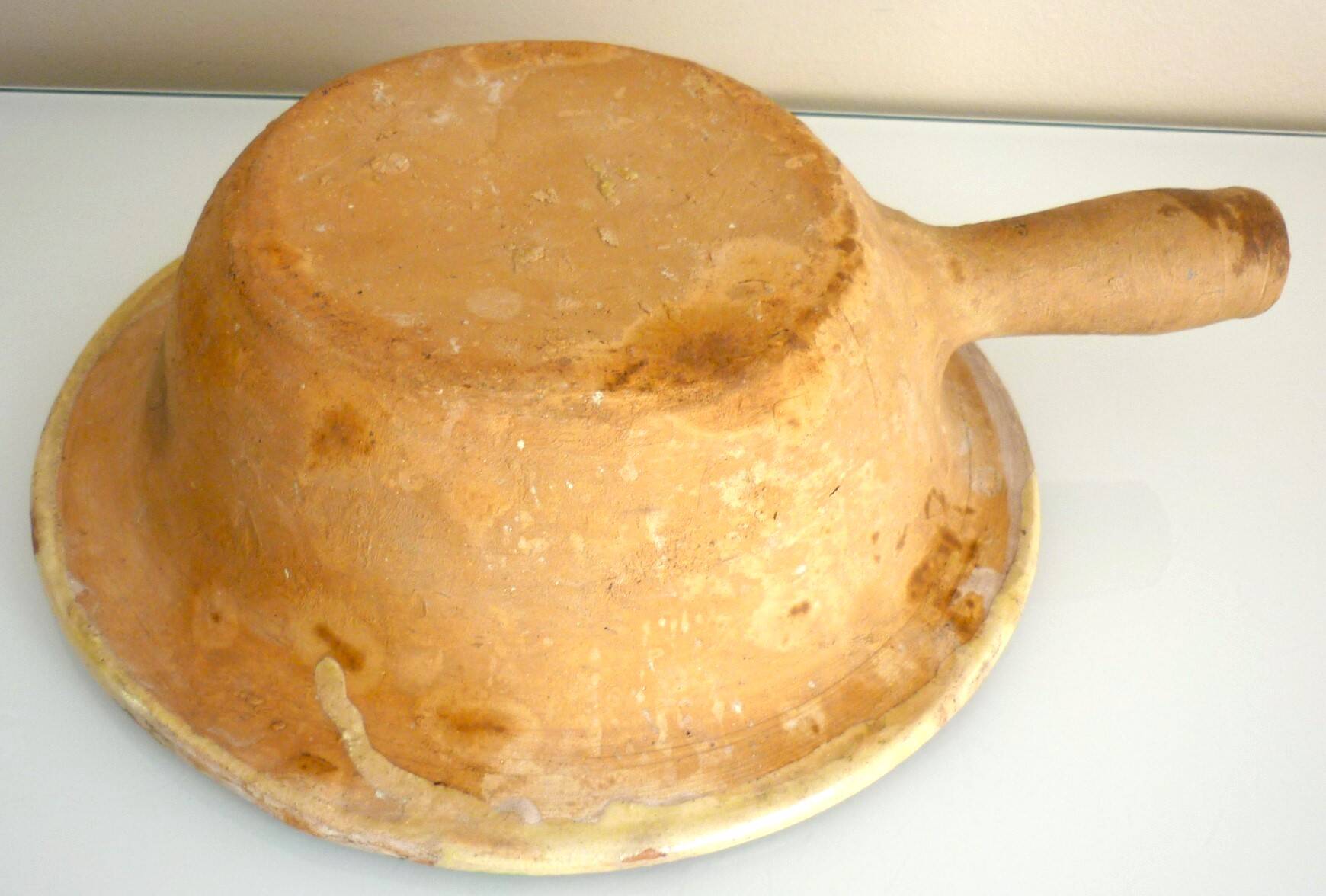 Frying pan, old caquelon, yellow glazed earthenware from the south of France.