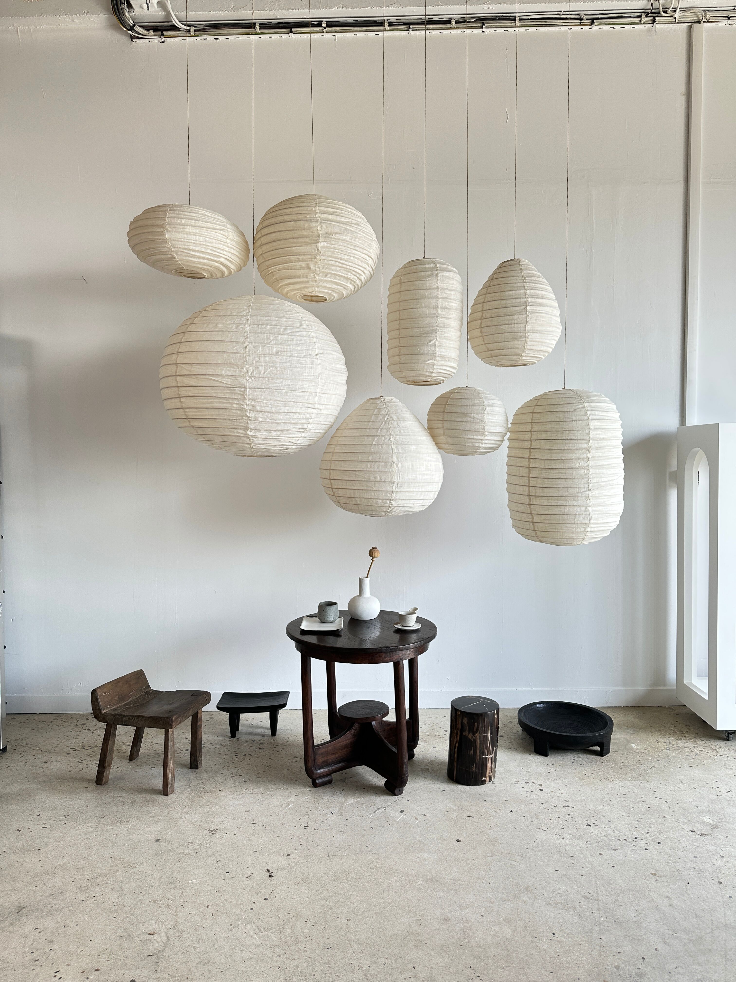 Suspension in rattan and natural japanese linen in the shape of a drop