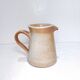 Vintage creamer in marsh sandstone