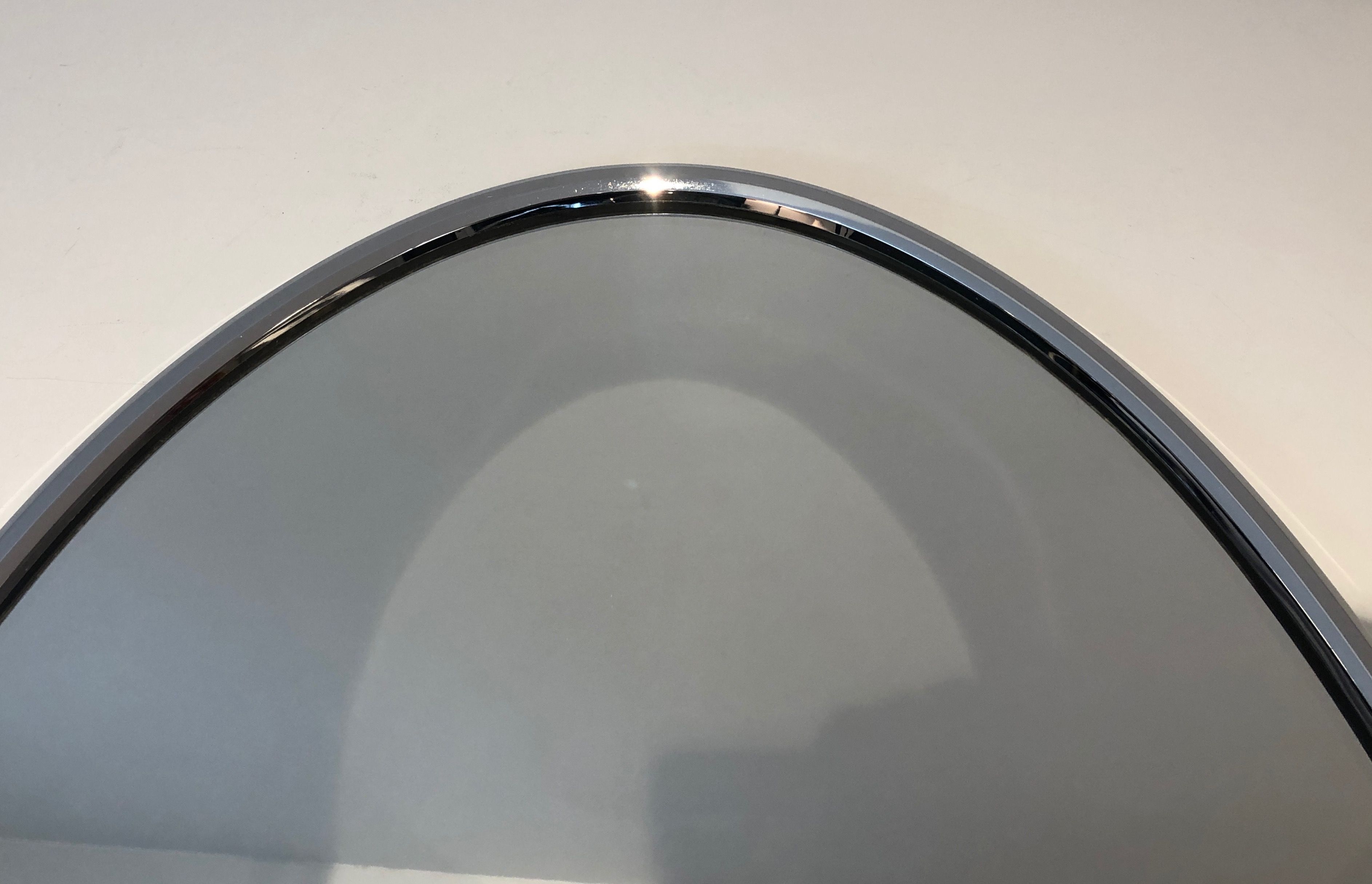 Oval chrome mirror in Art Deco style. Circa 1970.
