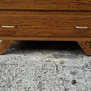 Compass leg chest of drawers