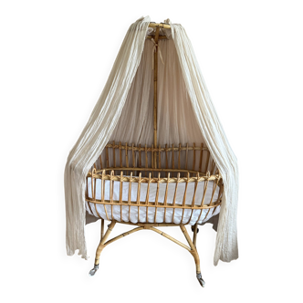 Antique rattan cradle