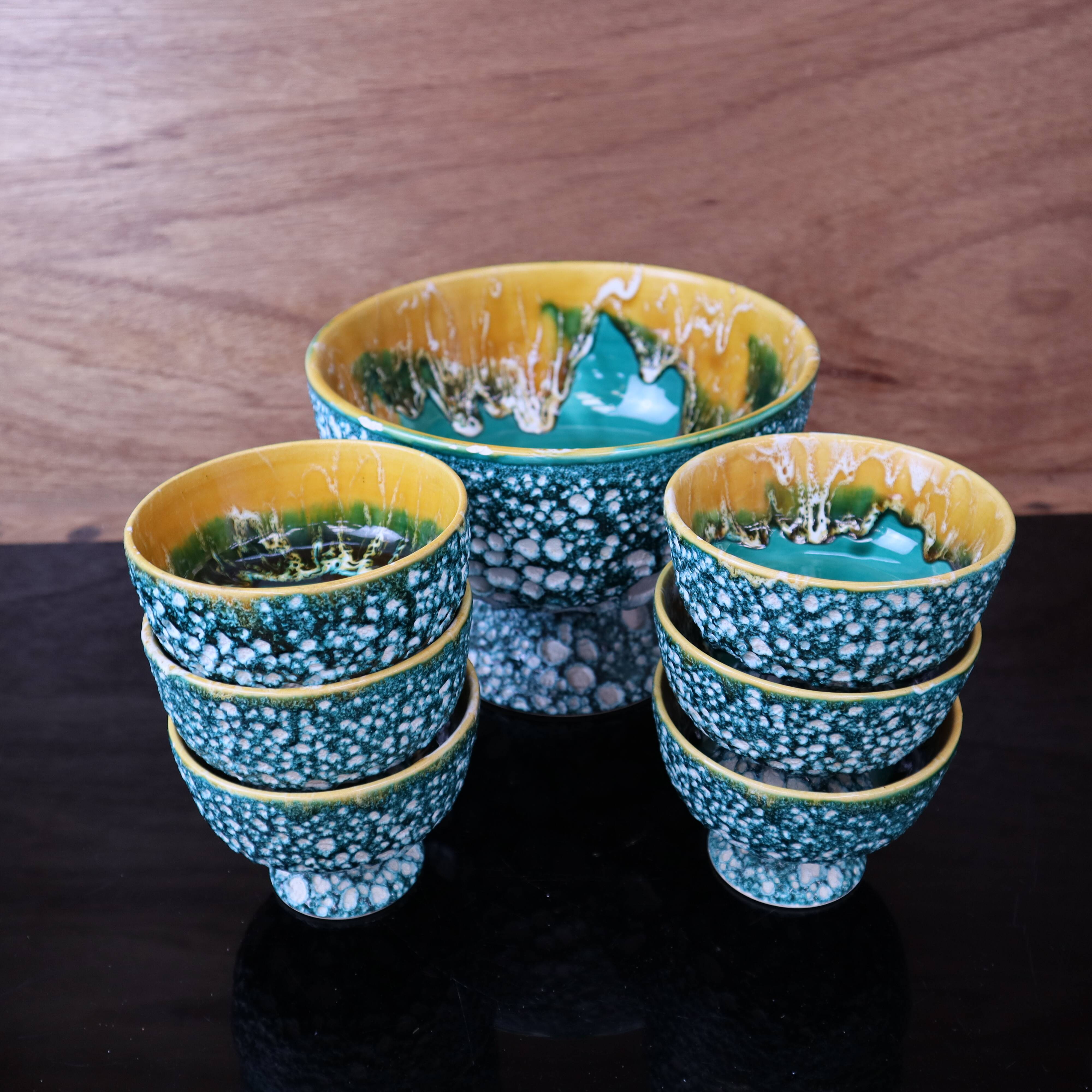 Salad bowl and its 6 Lava Green bowls in Vallauris style.