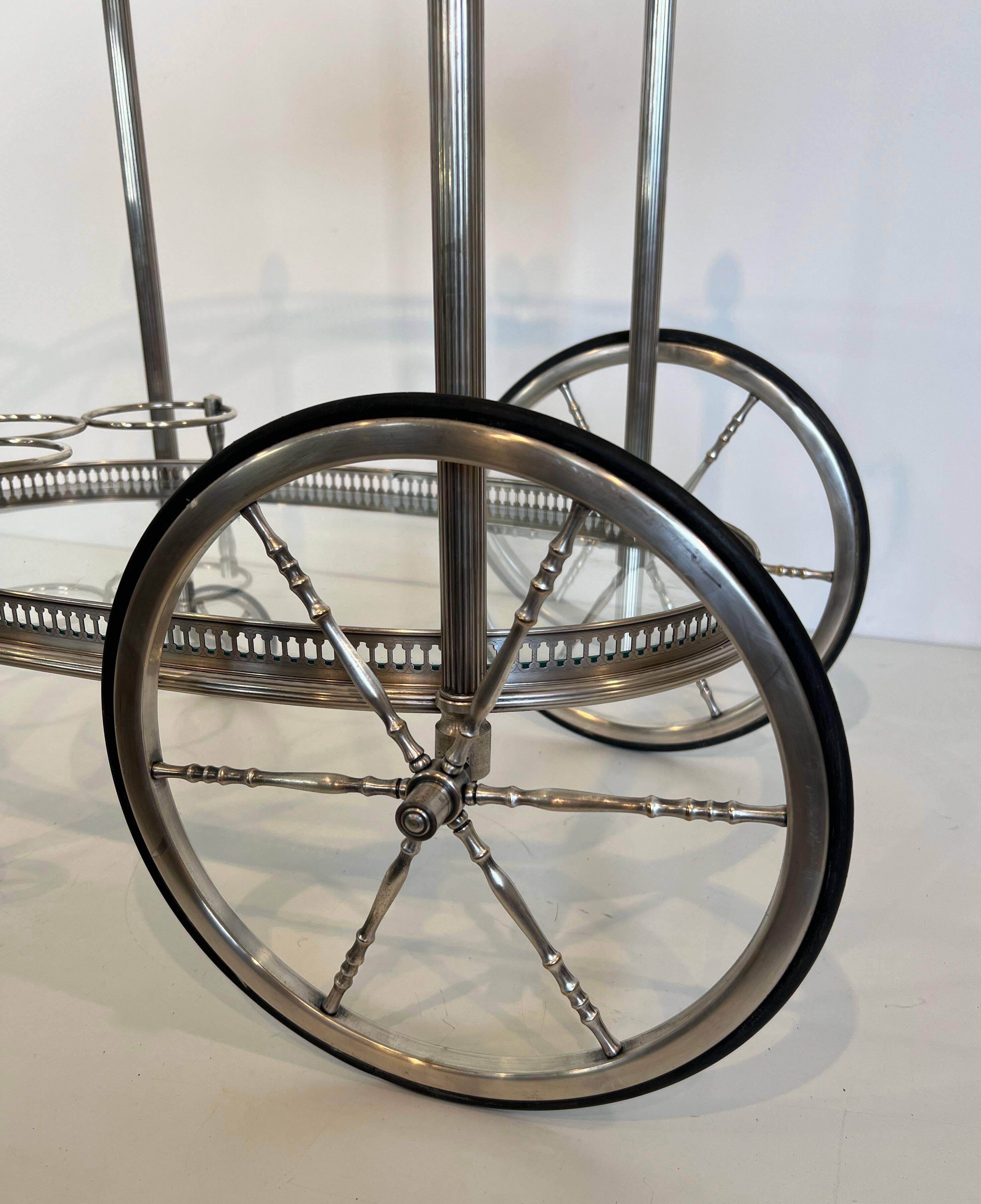 Oval silver-plated brass trolley from Maison Baguès.