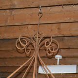 A wrought iron candle chandelier / 118 cms in diameter