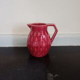 Small pitcher in old red earthenware