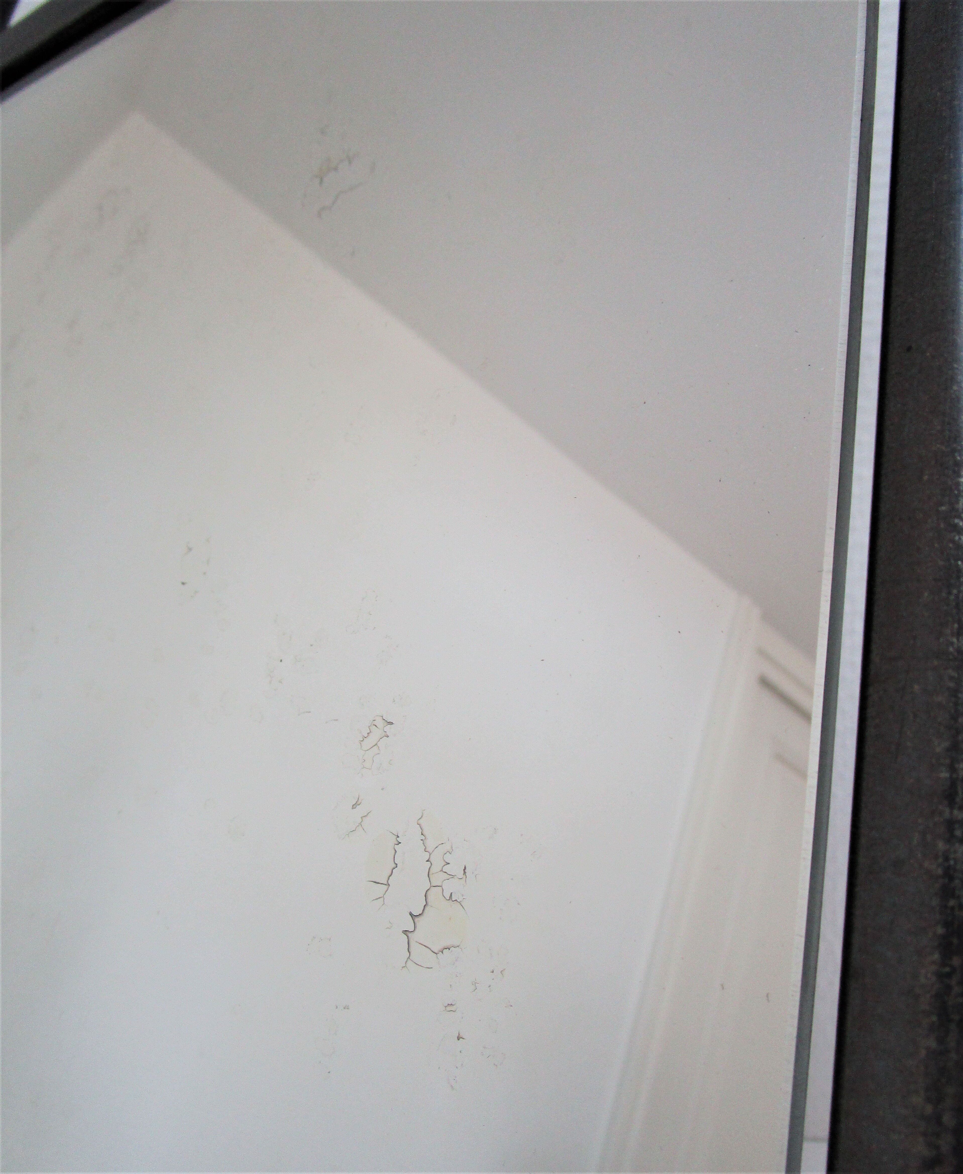 Vintage patinated metal shoe mirror