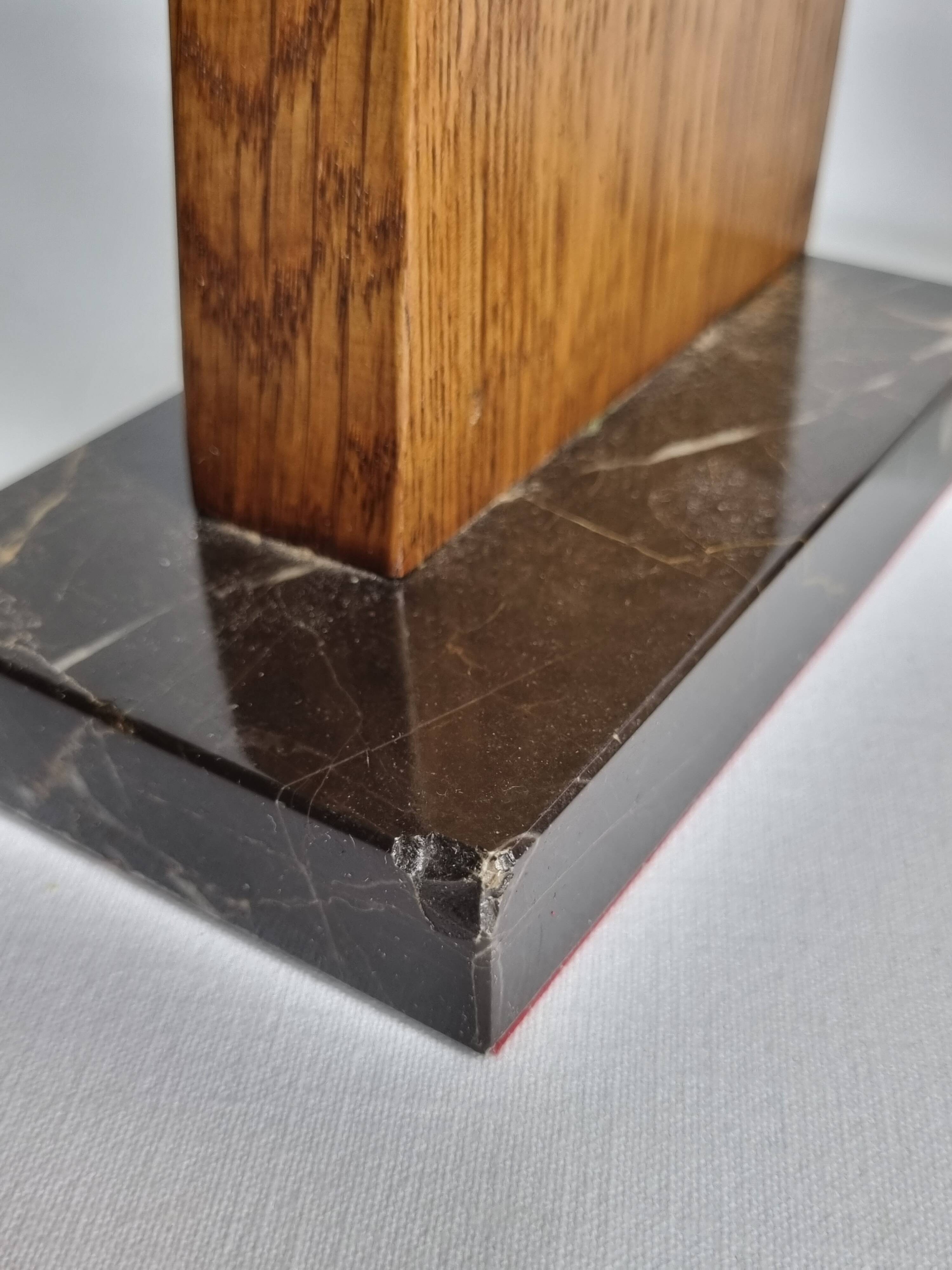 Pair of Art Deco bookends in solid wood and veined black marble