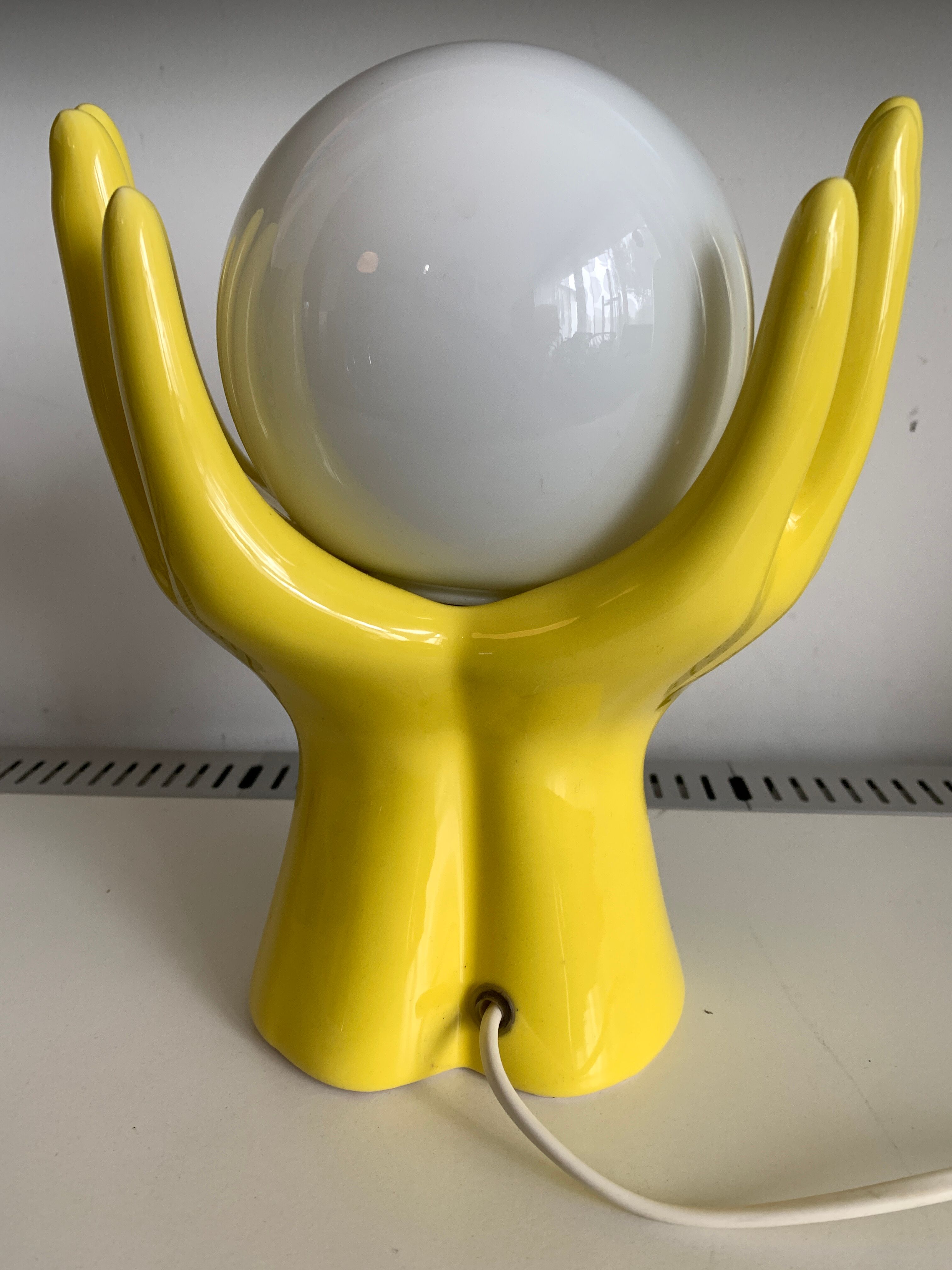 Yellow ceramic hand lamp
