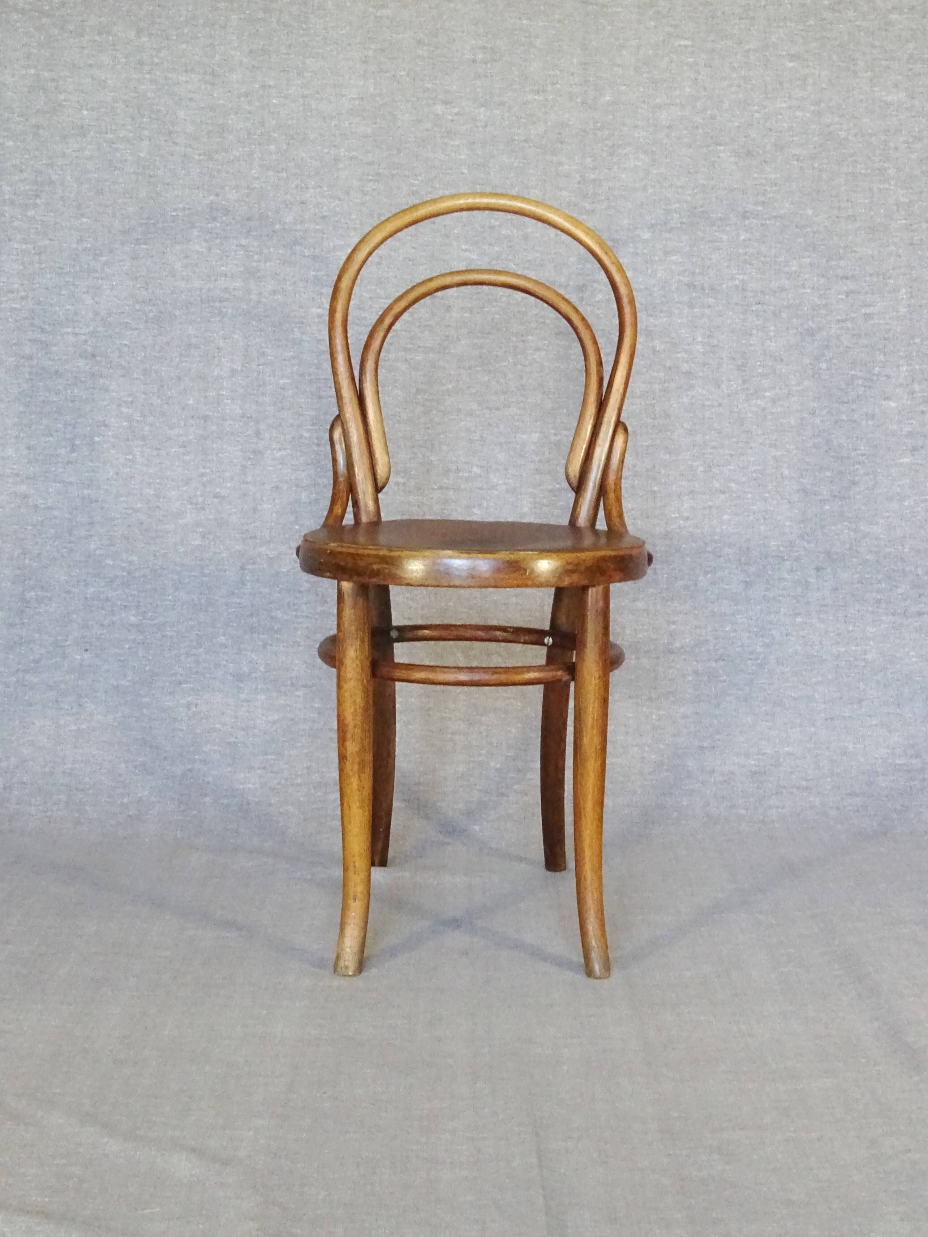 Set of 4 mismatched bistro chairs, 1900 to 1930 with wooden seats, Thonet, Baumann